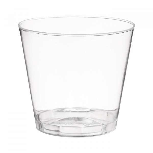 A clear 1 oz. Plastic Shot Glass with a smooth, transparent design, ideal for serving beverages, condiments, sauces, and samples in bars, restaurants, and catering events.