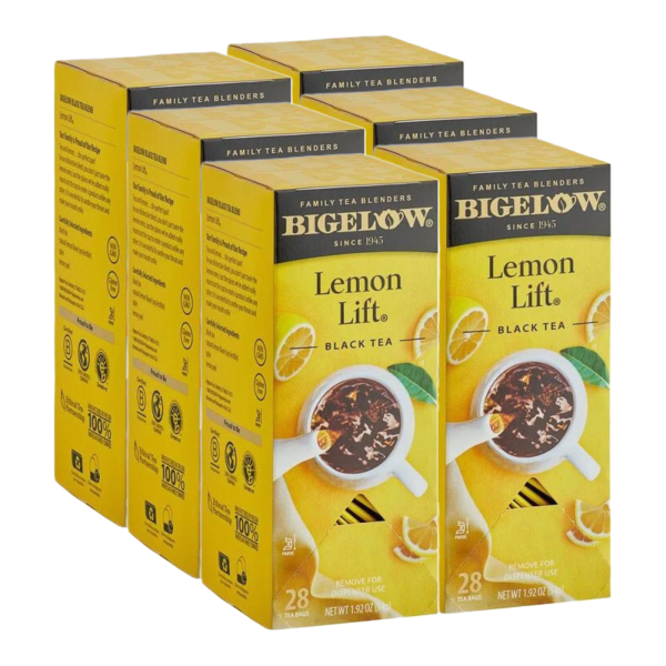 Six boxes of Bigelow Lemon Lift Black Tea, each containing 28 individually wrapped tea bags, with bright yellow packaging featuring lemon slices and a steaming cup of tea.