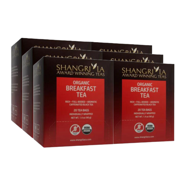Six boxes of Shangri La Organic Breakfast Tea, each containing 20 individually wrapped tea bags. Labeled as USDA Organic with a rich, full-bodied black tea blend.
