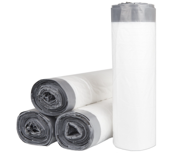 Four rolls of white drawstring trash bags with gray drawstring closures, stacked together. One roll is standing upright, showcasing the compact packaging and durable design for efficient waste disposal.