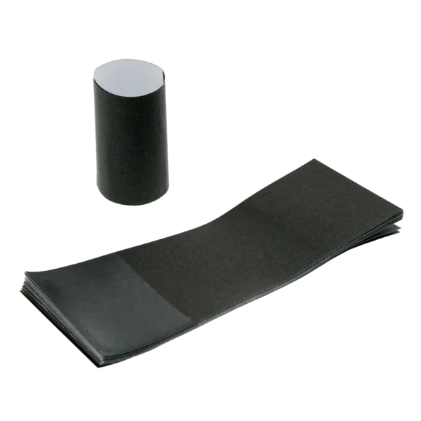 Black self-sealing napkin bands shown as a flat stack with one formed into a closed loop, featuring a visible adhesive strip, displayed on a white background.