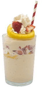 Strawberry shortcake parfait shake in a clear glass, layered with strawberry pieces and cake, topped with whipped cream, a whole strawberry, yellow cake ring, and a red-striped straw.