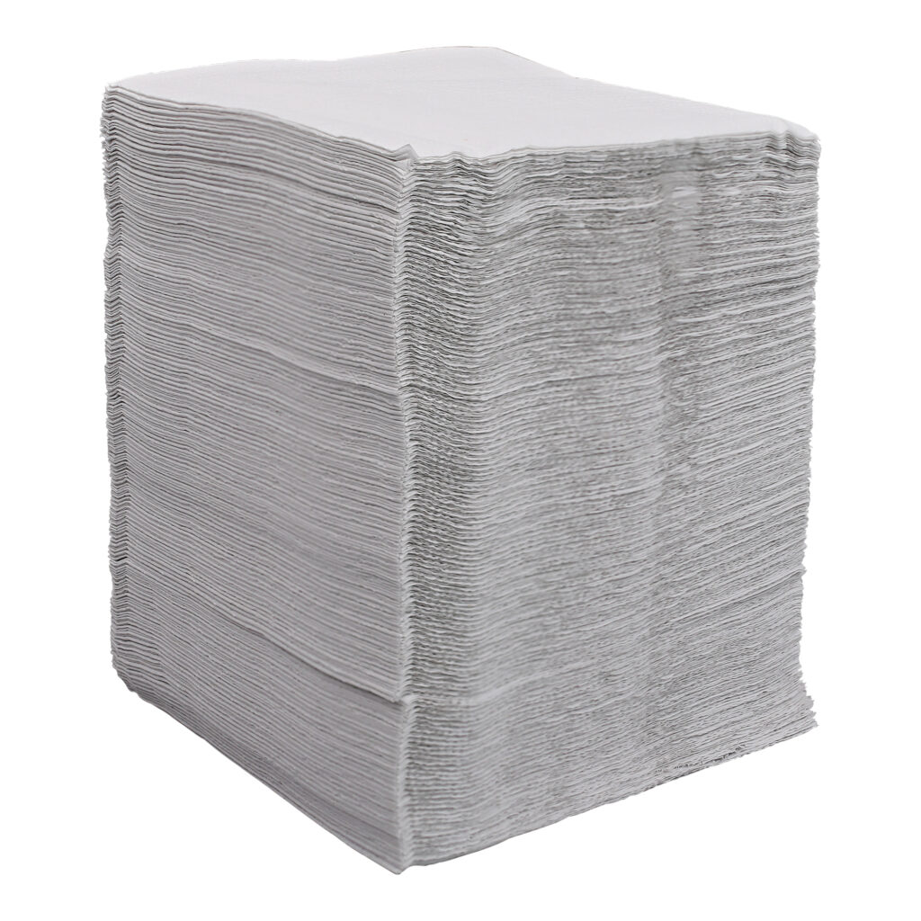 Tall stack of white folded Empress luncheon napkins arranged tightly and viewed from an angled side perspective.