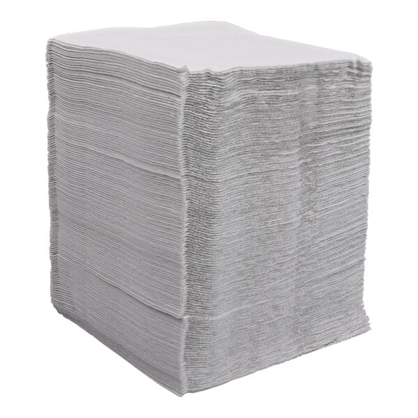 Tall stack of white folded Empress luncheon napkins arranged tightly and viewed from an angled side perspective.