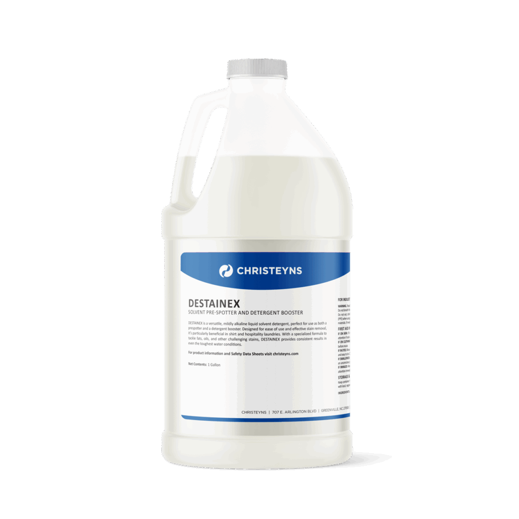 A 1-gallon white plastic jug of Christeyns Destainex Liquid Detergent Booster with a blue and white label displaying product details and the Christeyns logo.