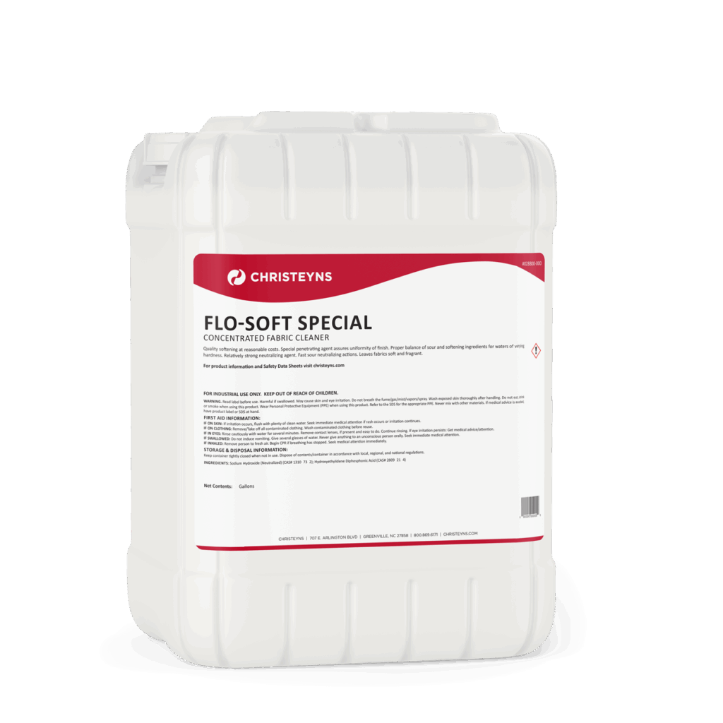 Christeyns Flo-Soft Special Concentrated Fabric Cleaner in a 5-gallon white plastic container with a red and white product label.